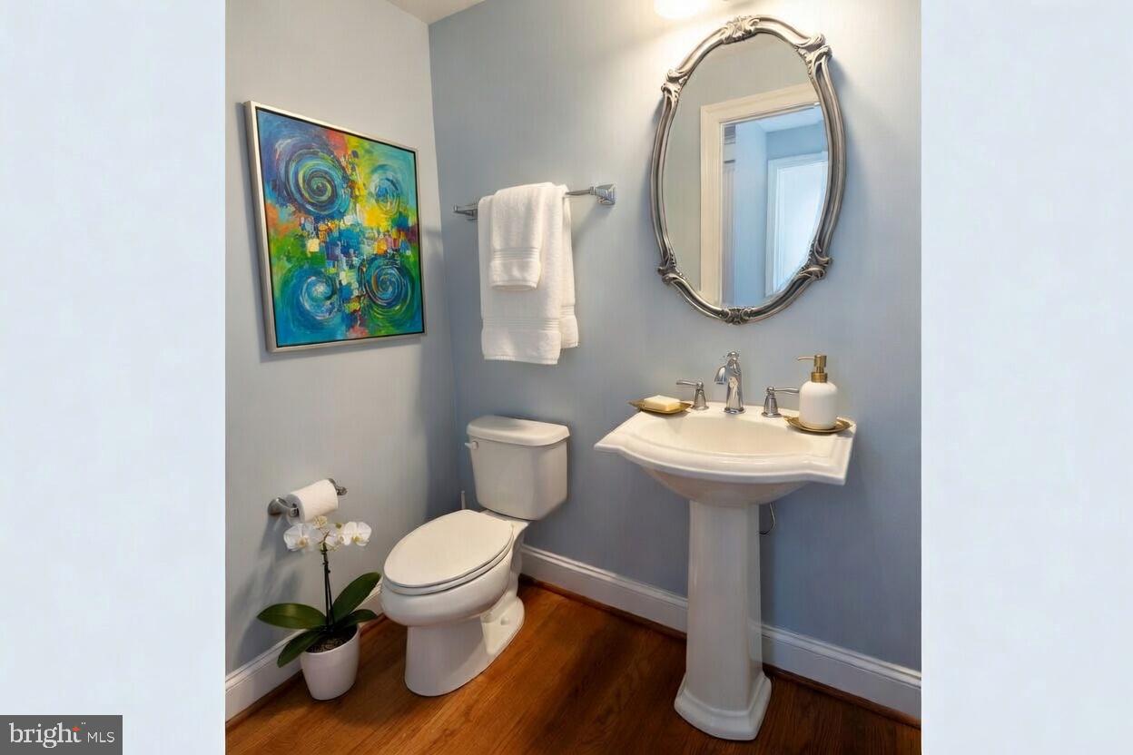 3990 Cephas Child Road Doylestown, PA 18902 - Photo 12 of 53 a bathroom with a toilet a sink and mirror