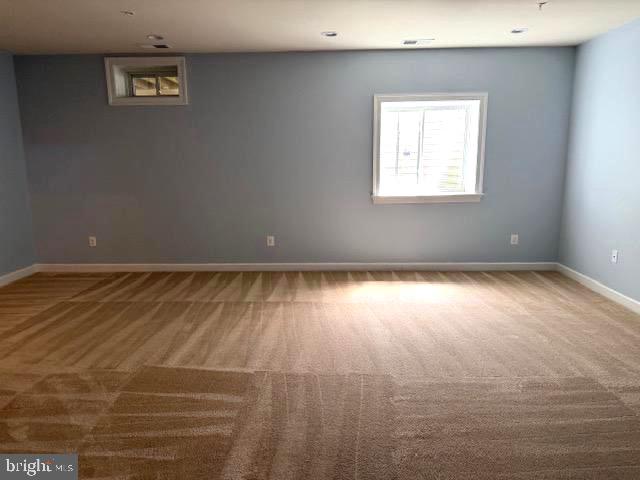3990 Cephas Child Road Doylestown, PA 18902 - Photo 20 of 53 an empty room with wooden floor and windows