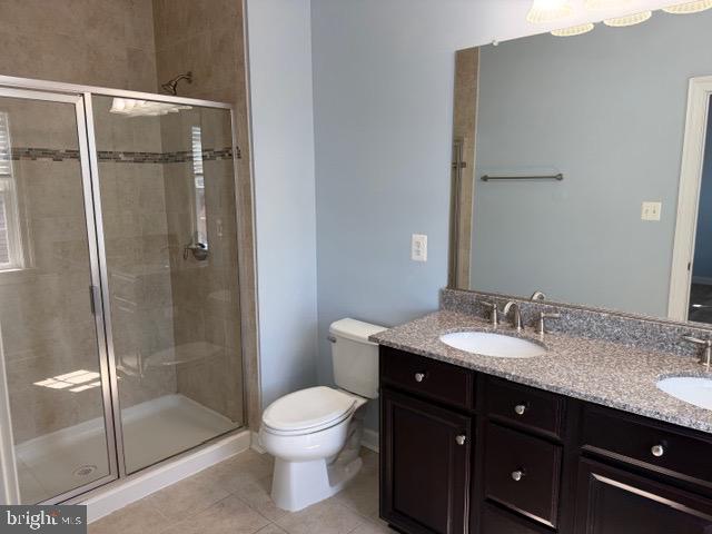 3990 Cephas Child Road Doylestown, PA 18902 - Photo 30 of 53 a bathroom with a granite countertop sink toilet and shower