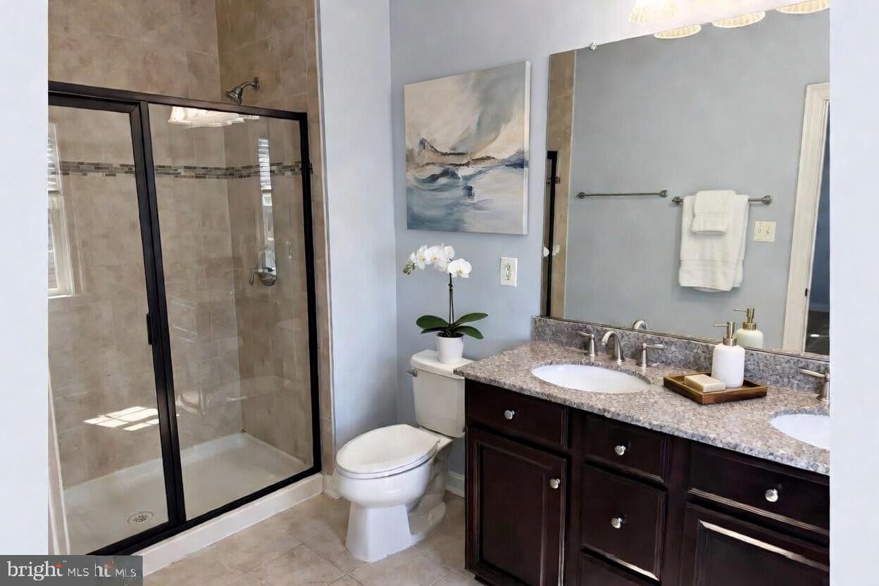 3990 Cephas Child Road Doylestown, PA 18902 - Photo 31 of 53 a bathroom with a granite countertop sink toilet and shower