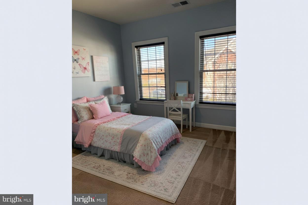3990 Cephas Child Road Doylestown, PA 18902 - Photo 35 of 53 a spacious bedroom with a bed and window