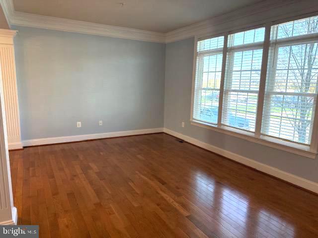 3990 Cephas Child Road Doylestown, PA 18902 - Photo 4 of 53 a view of an empty room with wooden floor and a window