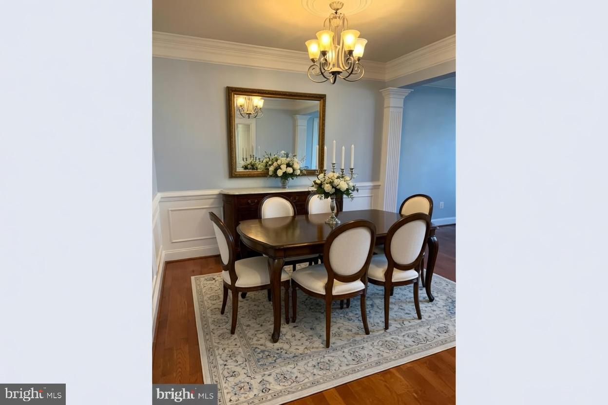 3990 Cephas Child Road Doylestown, PA 18902 - Photo 9 of 53 a view of a dining room with furniture and a chandelier