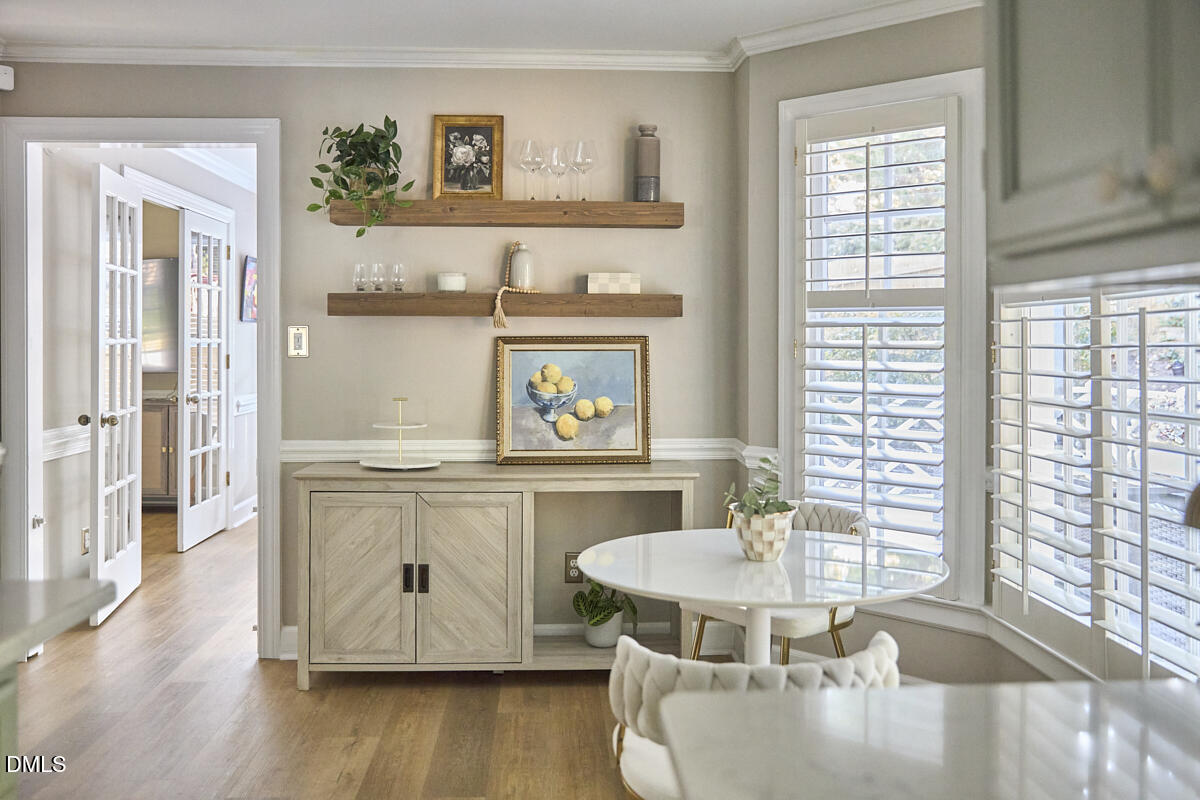 6725 Eastbrook Drive Raleigh, NC 27615 - Photo 18 of 48 a spacious bathroom with a granite countertop sink and a window