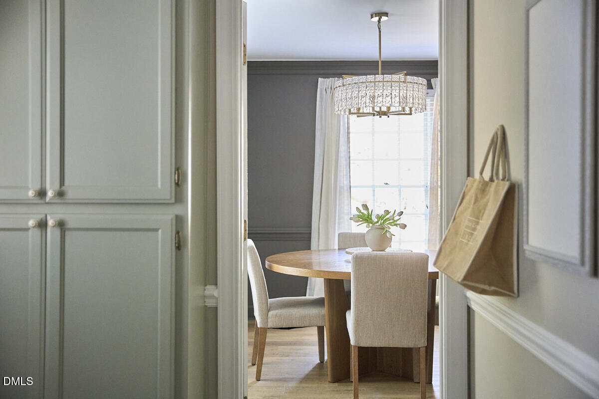 6725 Eastbrook Drive Raleigh, NC 27615 - Photo 21 of 48 a dining room with furniture and window