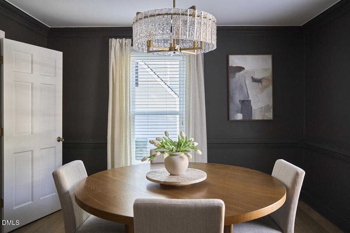 6725 Eastbrook Drive Raleigh, NC 27615 - Photo 22 of 48 a dining room with furniture and window