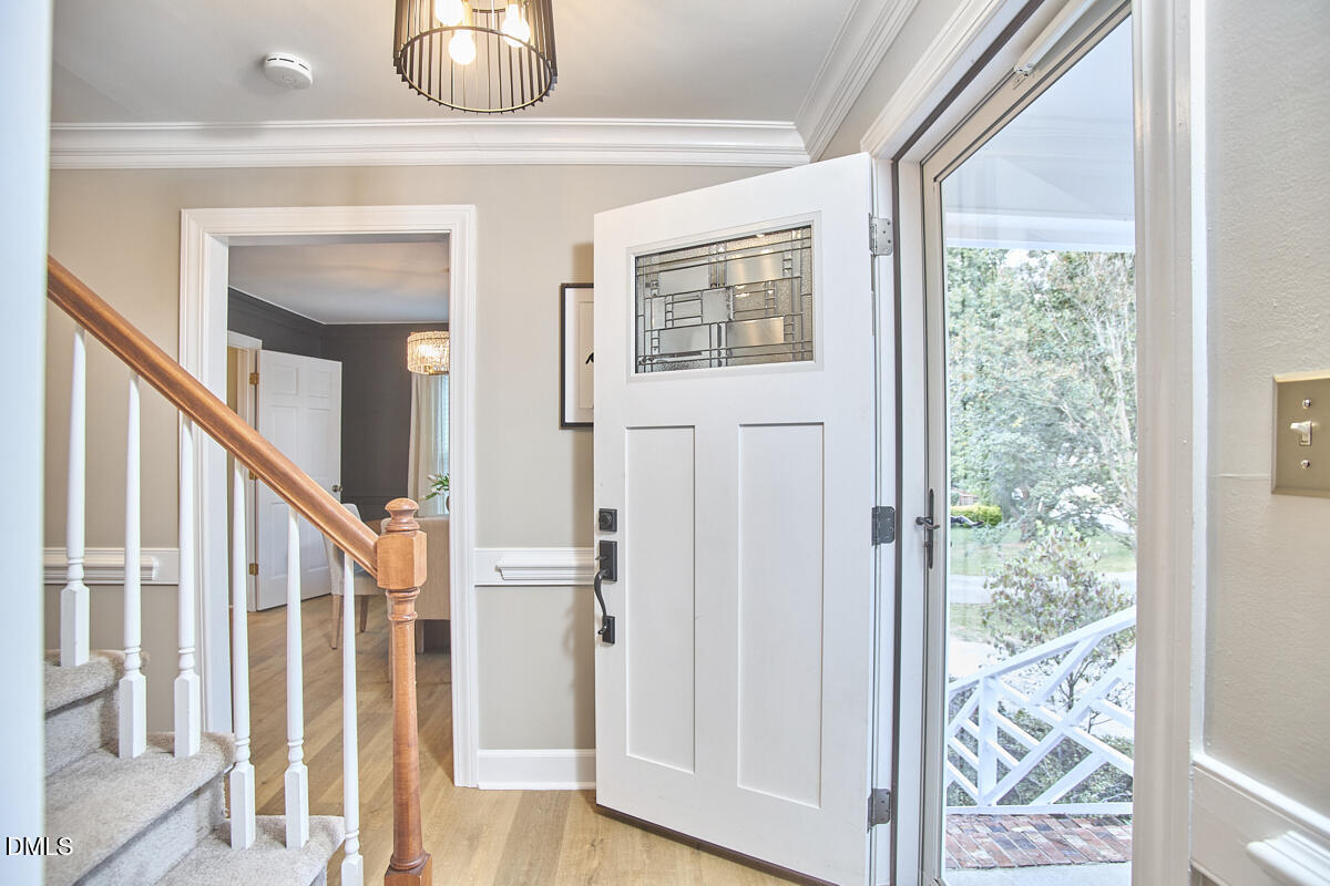6725 Eastbrook Drive Raleigh, NC 27615 - Photo 4 of 48 a view of front door