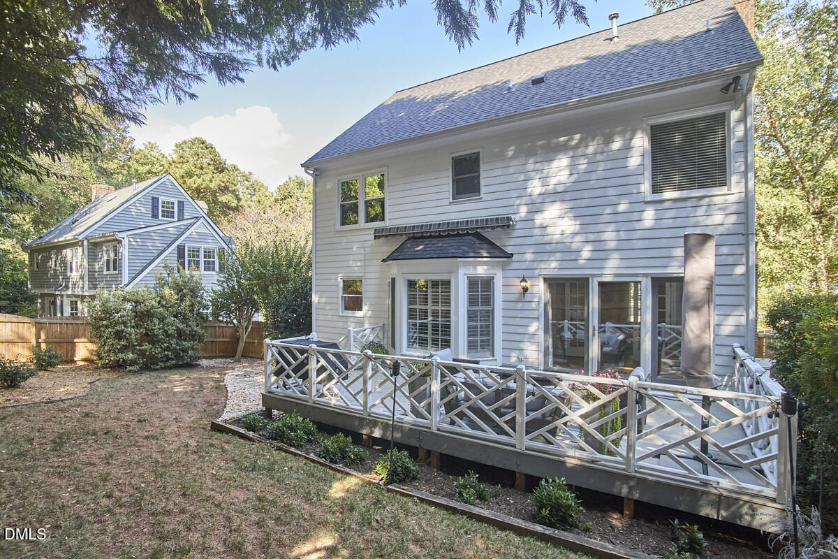 6725 Eastbrook Drive Raleigh, NC 27615 - Photo 45 of 48 a view of a house with a yard and furniture