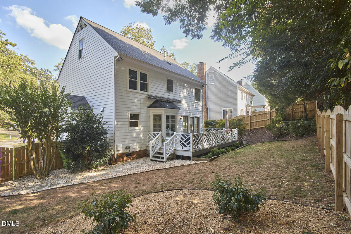 6725 Eastbrook Drive Raleigh, NC 27615 - Photo 46 of 48 a view of a house with yard and sitting area