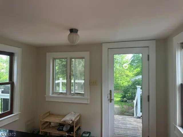 a room with furniture and a window