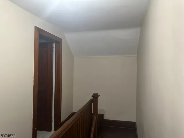 a view of hallway with stairs