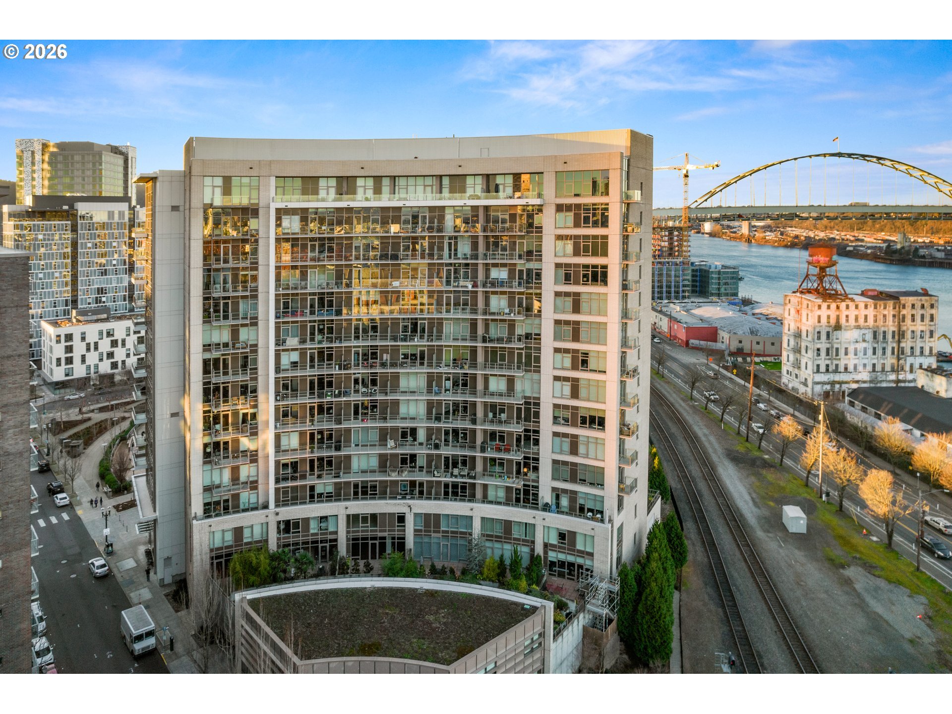 a view of a city with tall buildings
