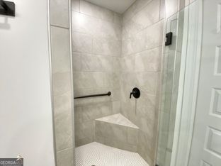 1333 Mooty Bridge Road, Unit 2 LaGrange, GA 30240 - Photo 8 of 17 a bathroom with a toilet and a shower