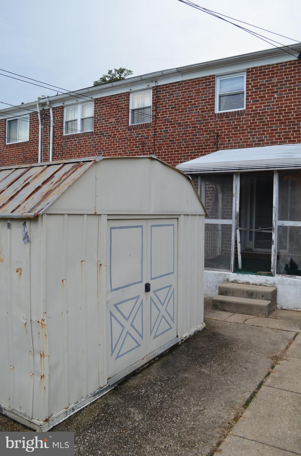 657 South Wickham Road Baltimore, MD 21229 - Photo 16 of 17 Shed & Screened in Porch