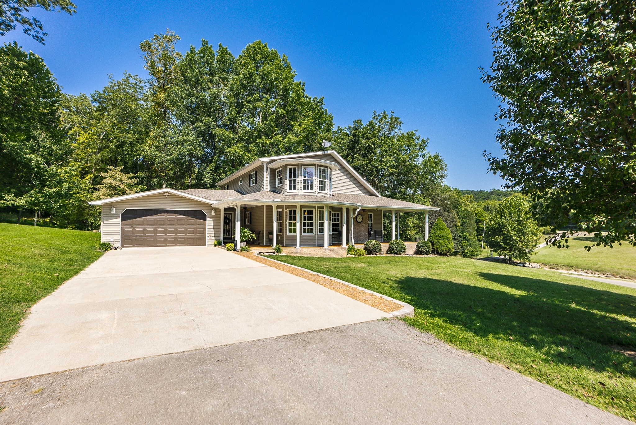 443 Mt Vernon Road Bethpage, TN 37022 - Photo 3 of 40 a front view of a house with a yard