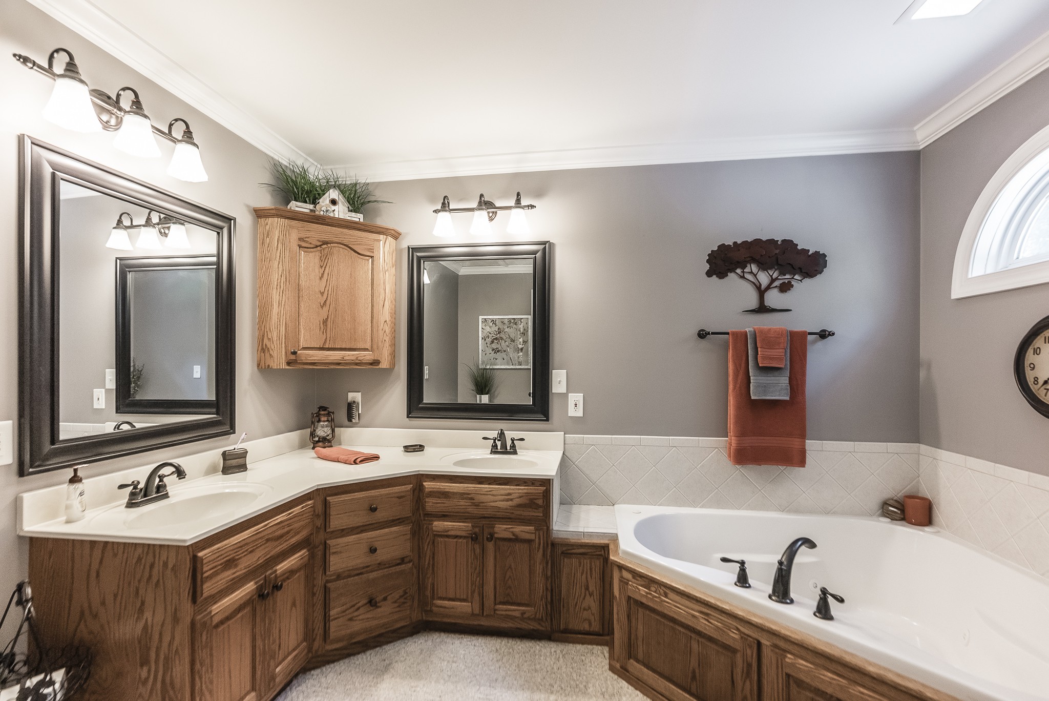 443 Mt Vernon Road Bethpage, TN 37022 - Photo 26 of 40 a bathroom with a tub double vanity sink and mirror