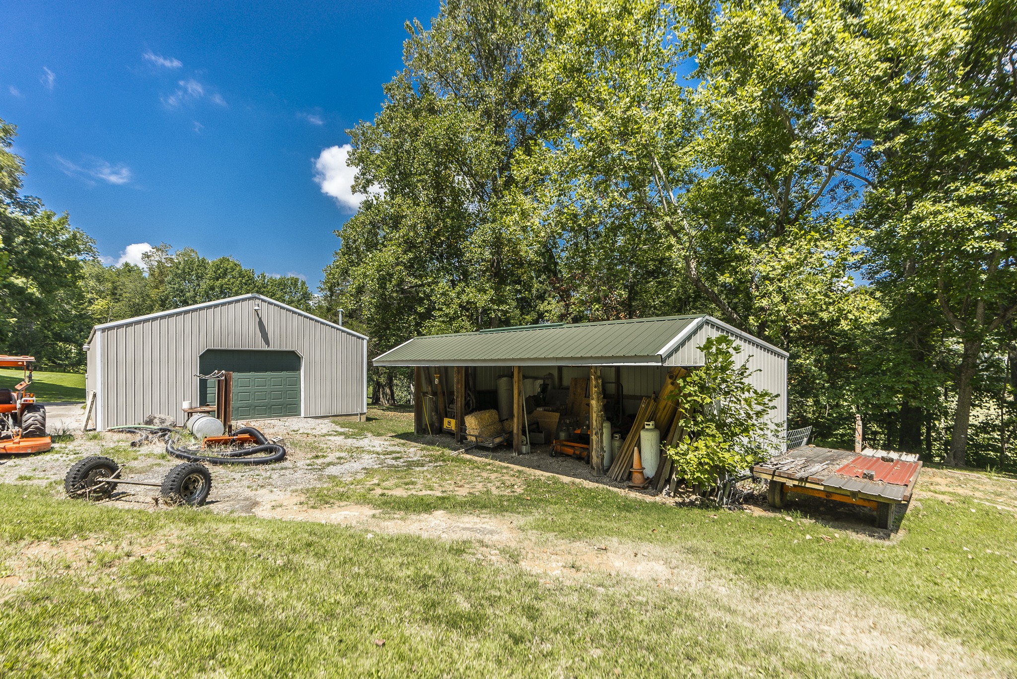443 Mt Vernon Road Bethpage, TN 37022 - Photo 28 of 40 a front view of a house with a garden and trees