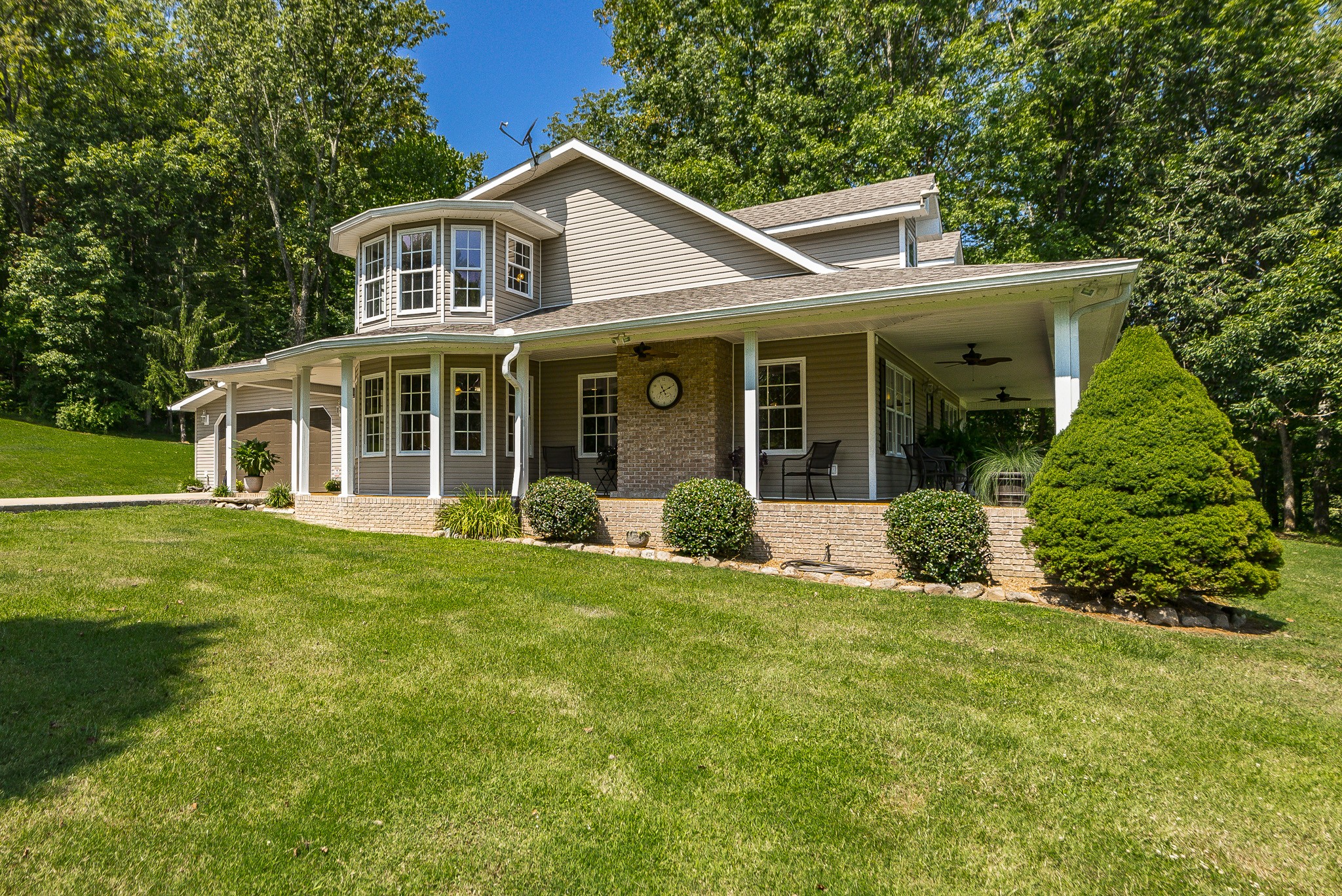 443 Mt Vernon Road Bethpage, TN 37022 - Photo 4 of 40 a view of a house with a yard and plants