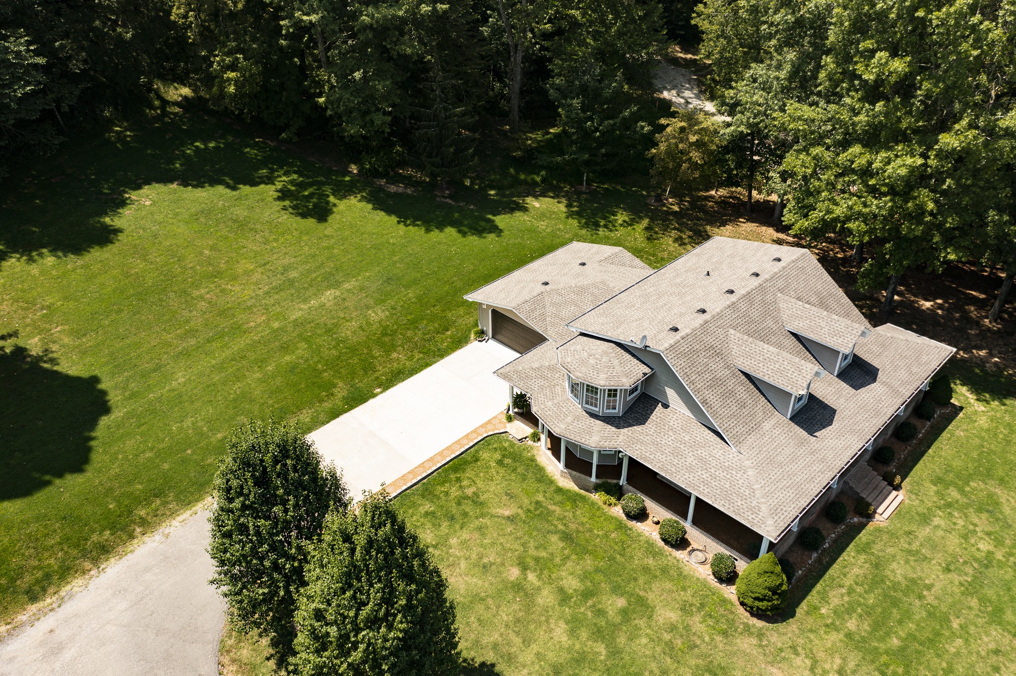 443 Mt Vernon Road Bethpage, TN 37022 - Photo 39 of 40 an aerial view of a house with yard swimming pool and outdoor seating