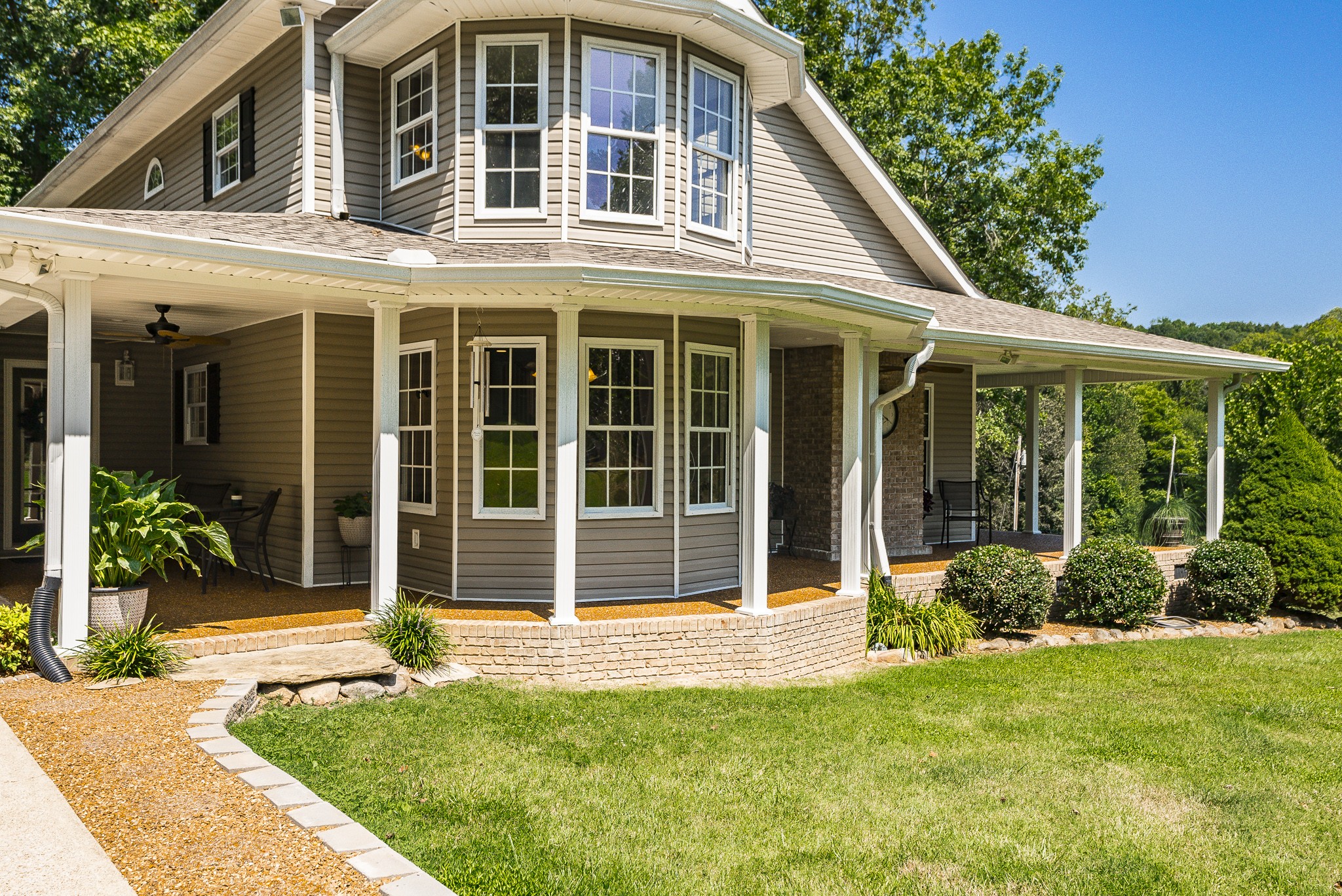 443 Mt Vernon Road Bethpage, TN 37022 - Photo 5 of 40 a view of a house with backyard and porch