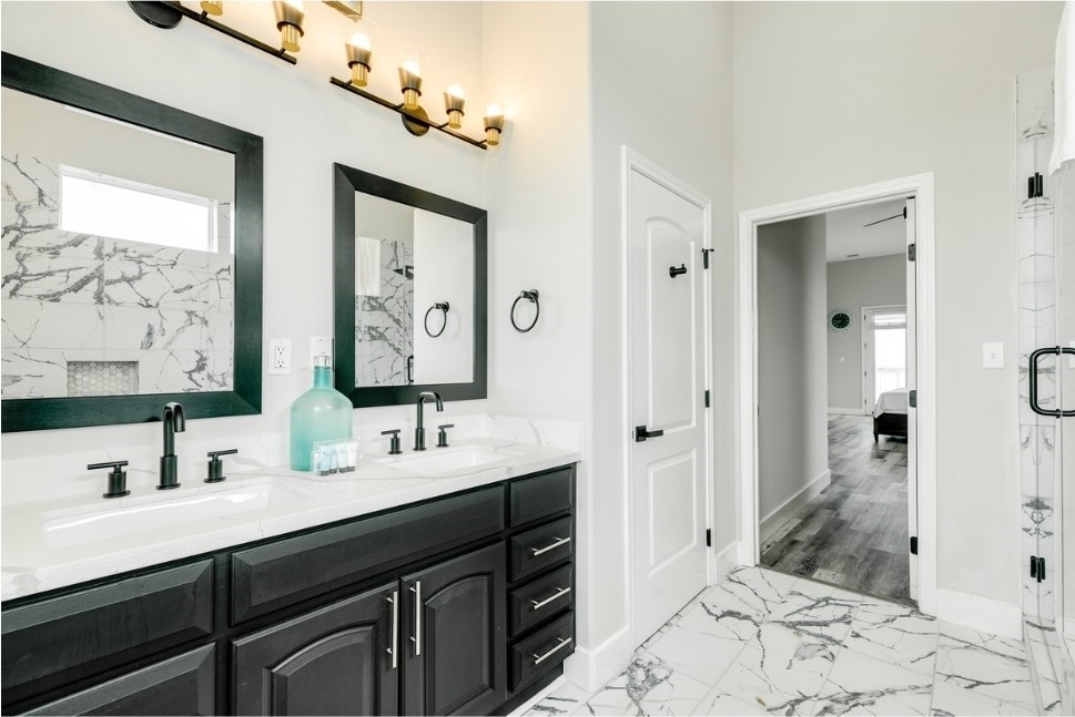 23327 Termini-San Luis Pass Road Galveston, TX 77554 - Photo 16 of 39 a bathroom with a double vanity sink mirror and double