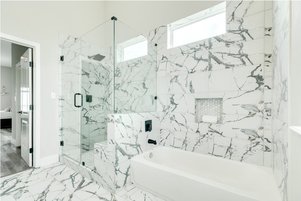 23327 Termini-San Luis Pass Road Galveston, TX 77554 - Photo 17 of 39 a bathroom with a bathtub and shower