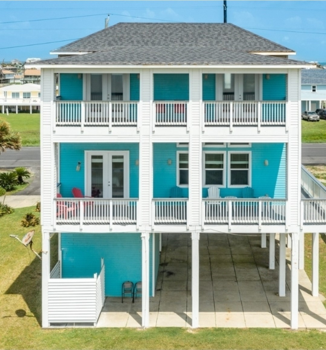 23327 Termini-San Luis Pass Road Galveston, TX 77554 - Photo 2 of 39 a view of a building with a outdoor space
