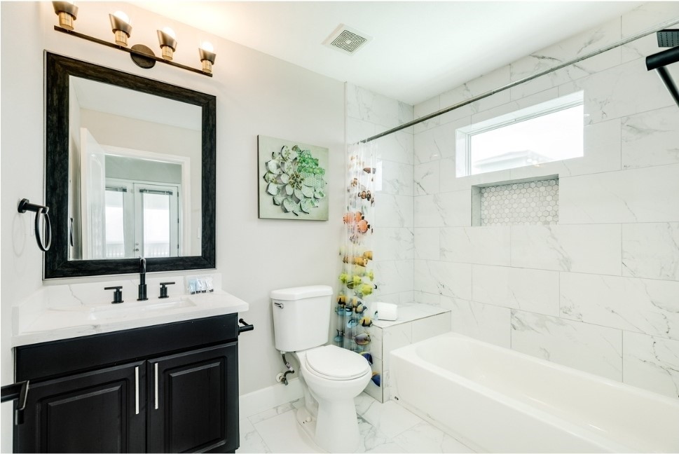 23327 Termini-San Luis Pass Road Galveston, TX 77554 - Photo 22 of 39 a bathroom with a sink a toilet and a bathtub