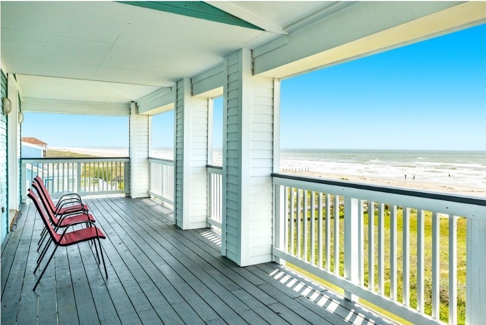 23327 Termini-San Luis Pass Road Galveston, TX 77554 - Photo 28 of 39 a view of a balcony with wooden floor