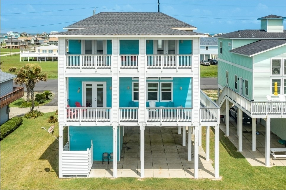 23327 Termini-San Luis Pass Road Galveston, TX 77554 - Photo 3 of 39 a view of a house with a backyard