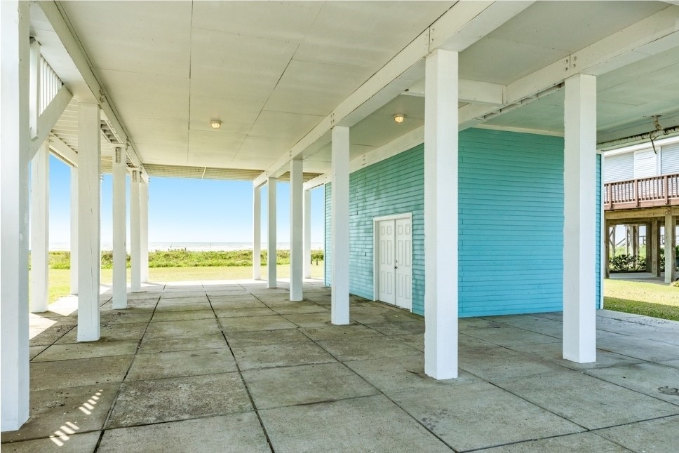 23327 Termini-San Luis Pass Road Galveston, TX 77554 - Photo 32 of 39 a bathroom with a tub shower and a sink
