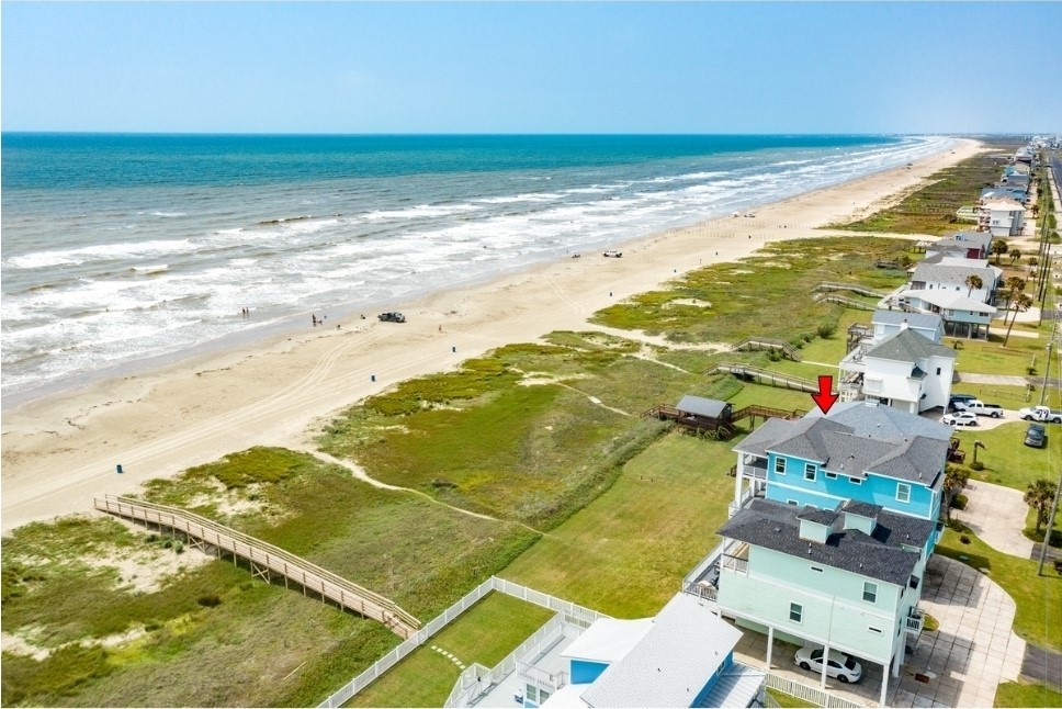 23327 Termini-San Luis Pass Road Galveston, TX 77554 - Photo 38 of 39 a view of an ocean and beach