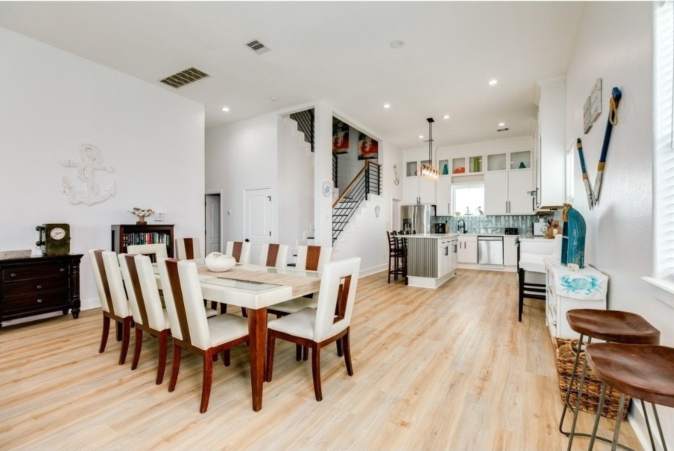 23327 Termini-San Luis Pass Road Galveston, TX 77554 - Photo 8 of 39 a view of a dining room with furniture and wooden floor