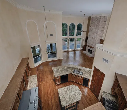 a kitchen with a stove and a refrigerator