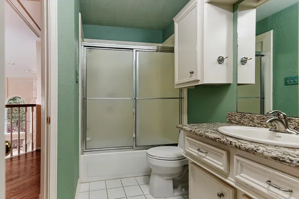 a kitchen with stainless steel appliances granite countertop a stove and a sink