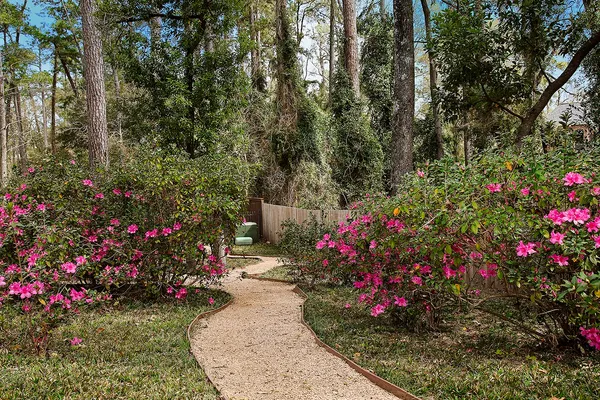 a front view of house with yard and seating space