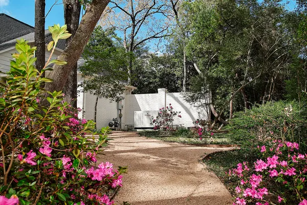 an aerial view of a house with yard and outdoor space
