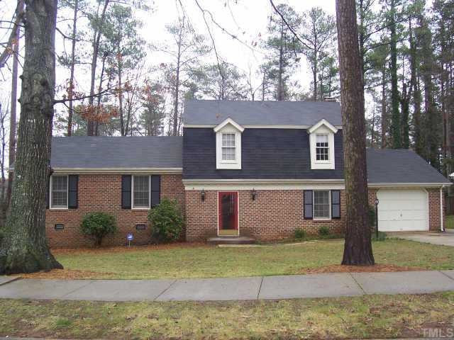 Brick front Robuck Split with a One-car Garage on a Third Acre Wooded Lot in the Ever-So-Popular North Ridge Neighborhood--Convenient to Shopping, Restaurants, Schools . . . Everything your family could ever want! Brand New Roof installed March 2008. Exterior Front