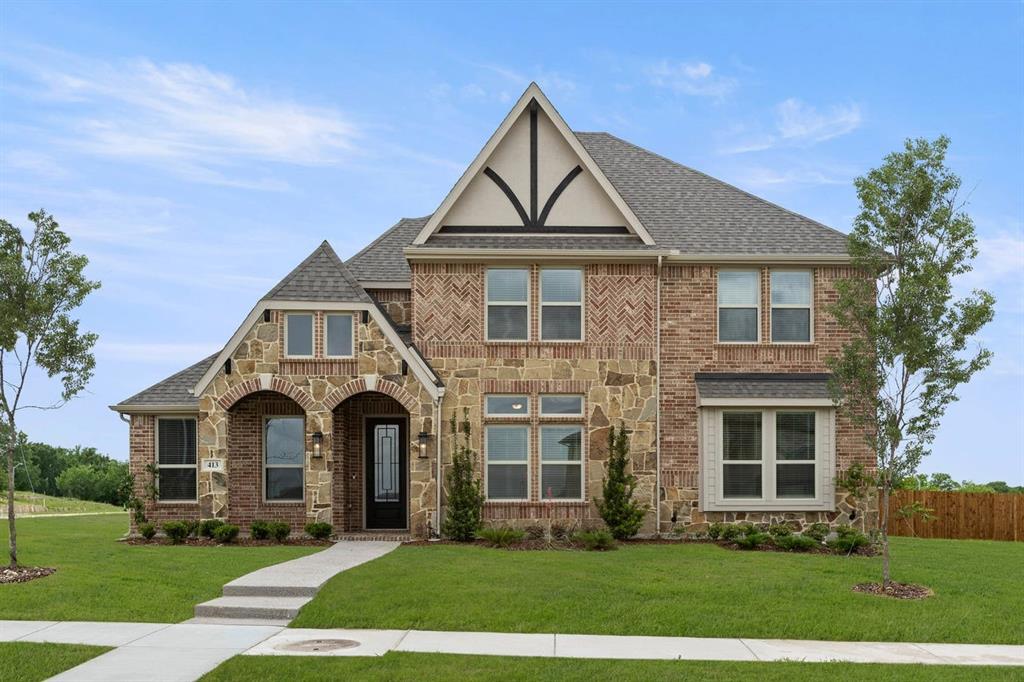 413 Tower Street DeSoto, TX 75115 - Photo 1 of 30 a front view of a house with a yard