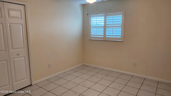 an empty room with cabinet