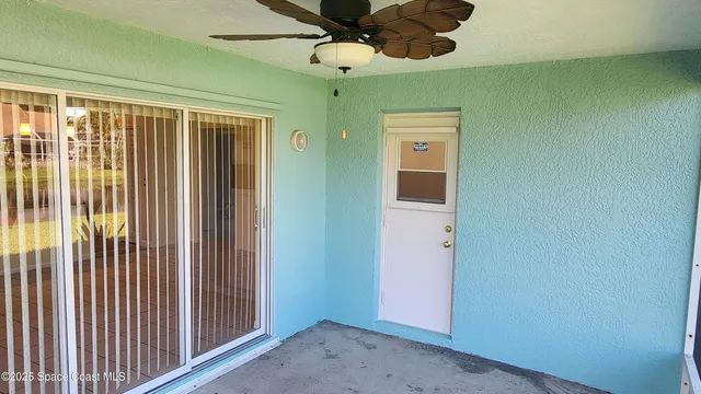a view of a hallway with entryway