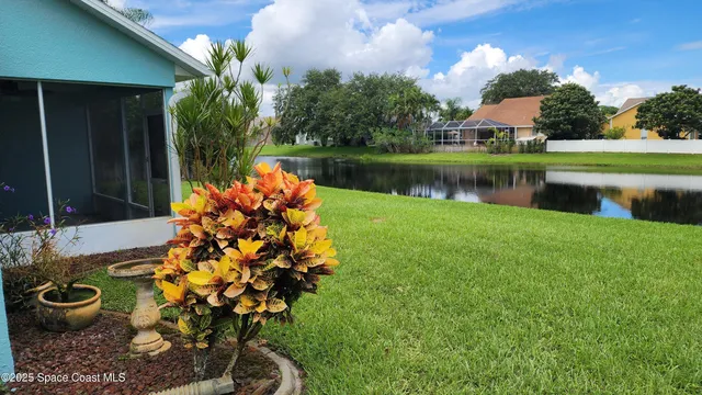 a lake view with a seating space and a lake view