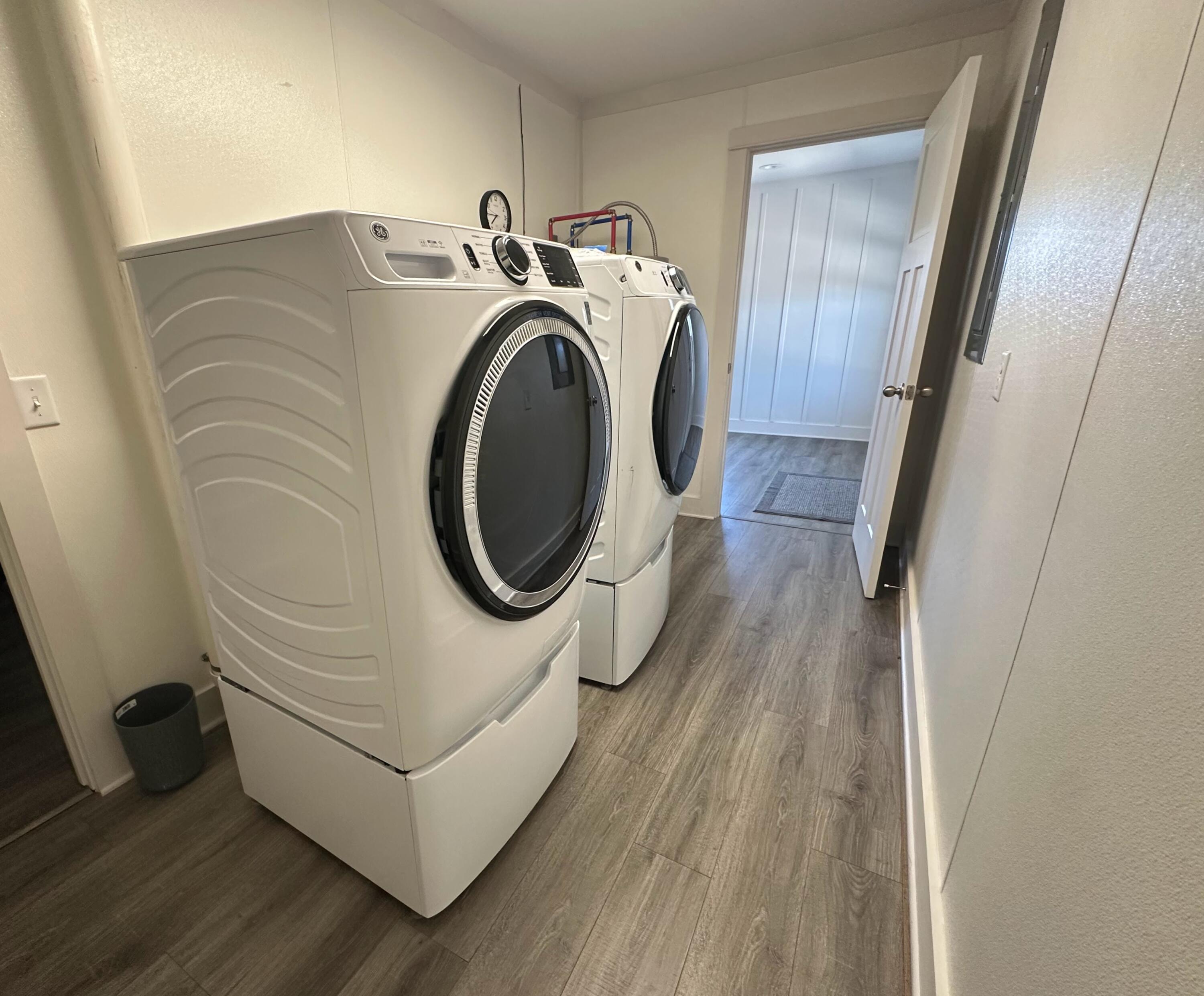 1014 East Indian Creek Ranch Road DeFuniak Springs, FL 32435 - Photo 13 of 17 a utility room with dryer and washer