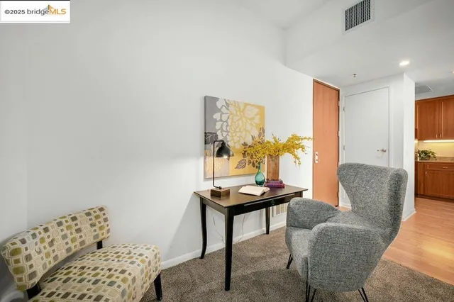 a view of a kitchen with a washer and dryer