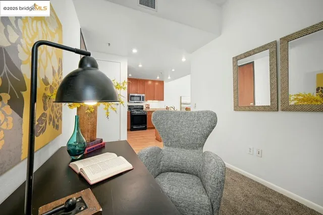 a view of a workspace with furniture