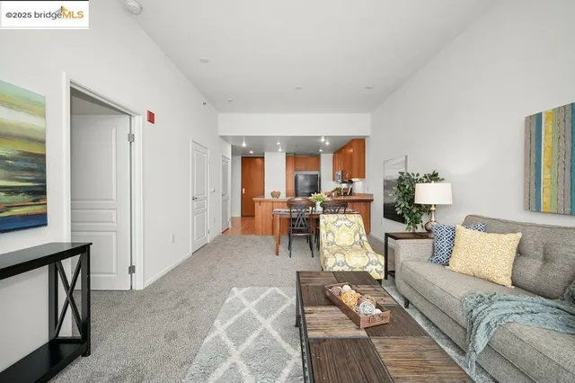 a living room with furniture and a table