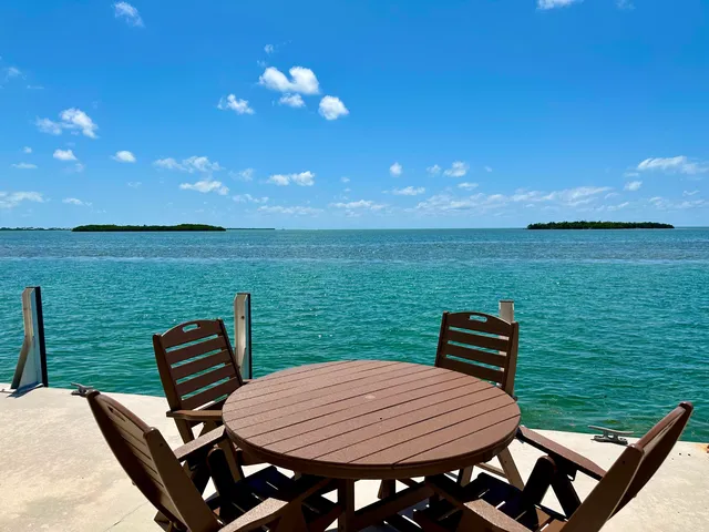 a view of a outdoor seating area with furniture