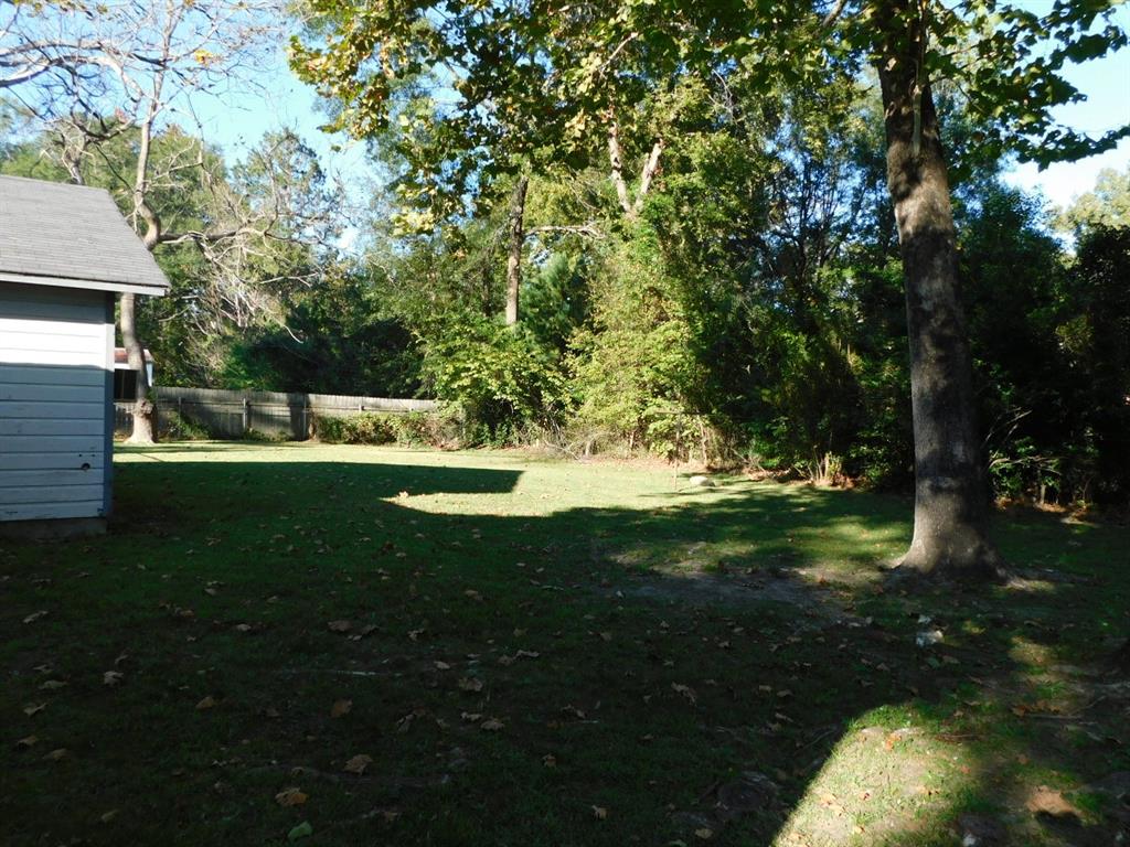 405 8th Street Northwest Springhill, LA 71075 - Photo 8 of 25 a view of field with grass and trees