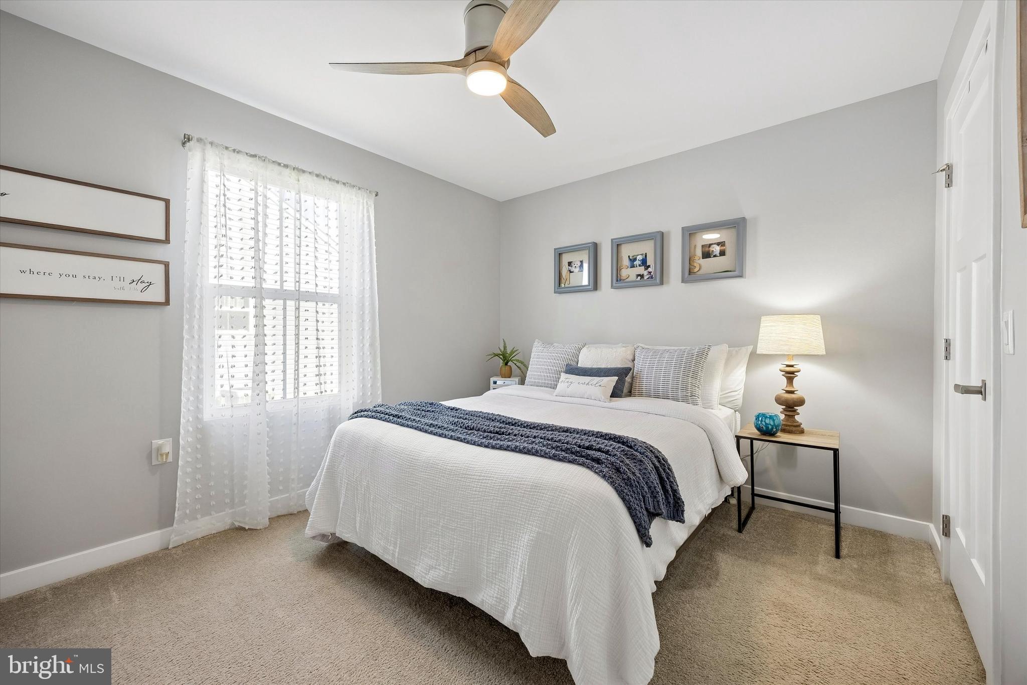 48 Senators Way Berlin, NJ 08009 - Photo 11 of 35 a spacious bedroom with a bed and a window