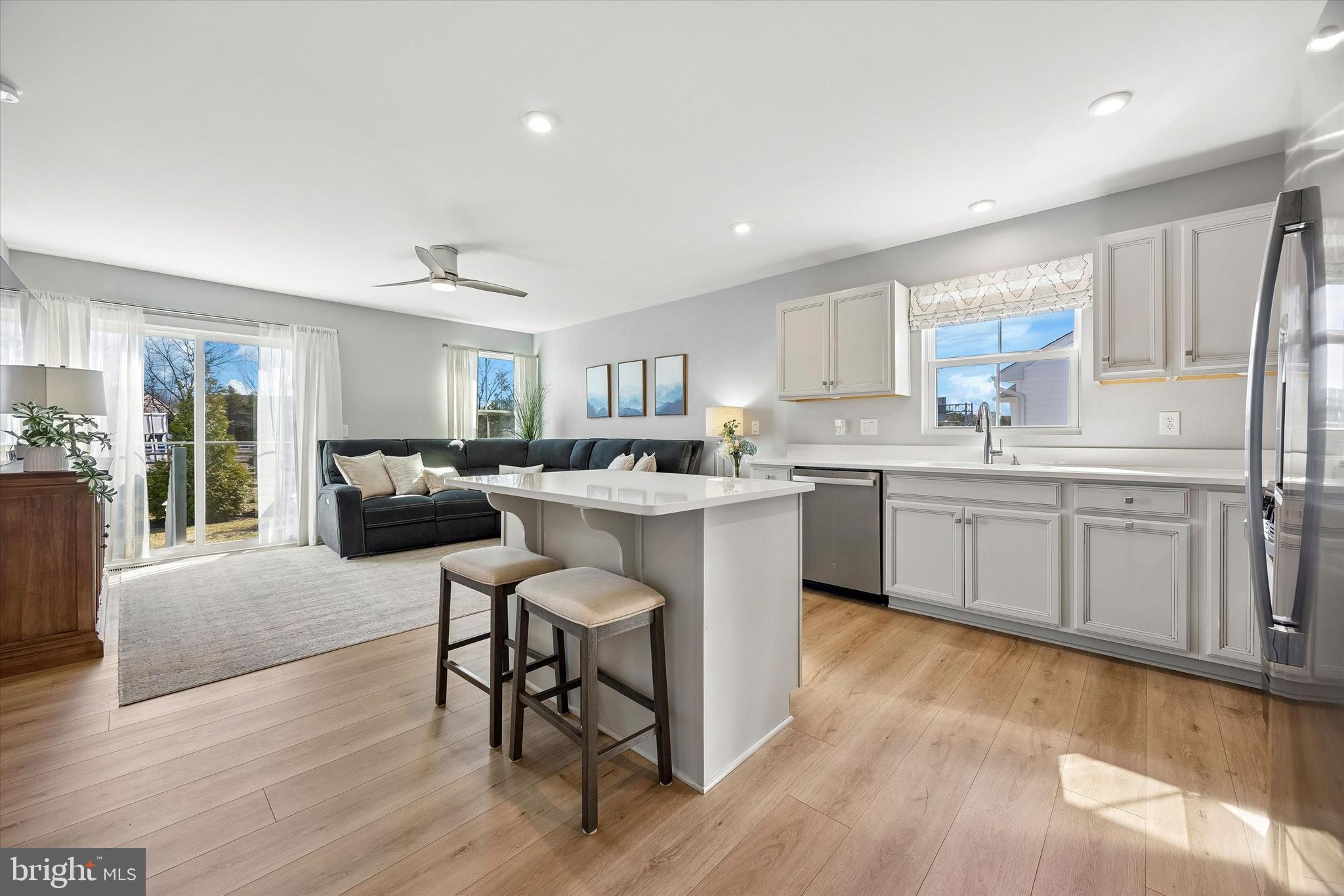 48 Senators Way Berlin, NJ 08009 - Photo 13 of 35 a kitchen with a sink cabinets and wooden floor